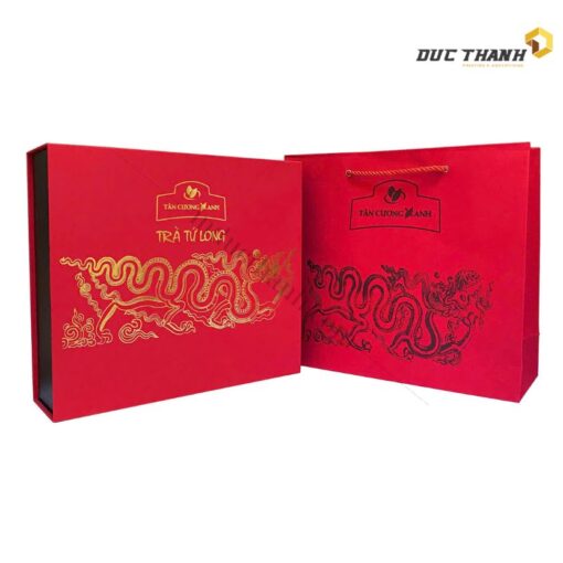 Mẫu hộp giấy đựng trà Tân Cương Rồng Vàng