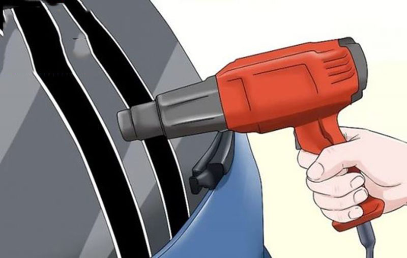 Cách gỡ decal dán kính bằng máy sấy tóc